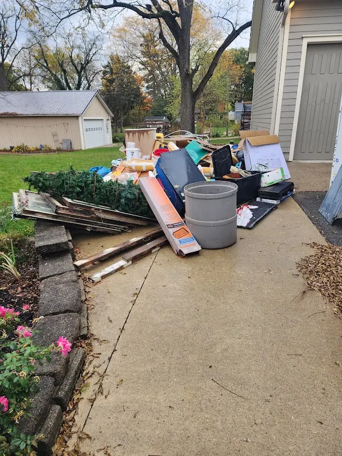 Dumpster being loaded with debris for 30 Yard Dumpster Rental in Saugerties